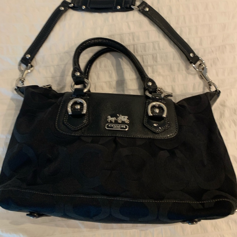 Black canvas signature coach logo purse